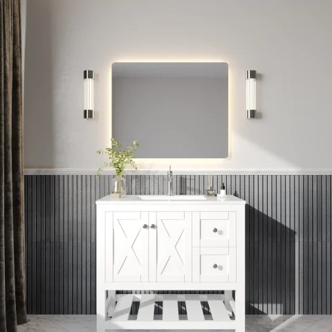 Modern bathroom with illuminated mirror, white vanity, and decorative wall paneling.