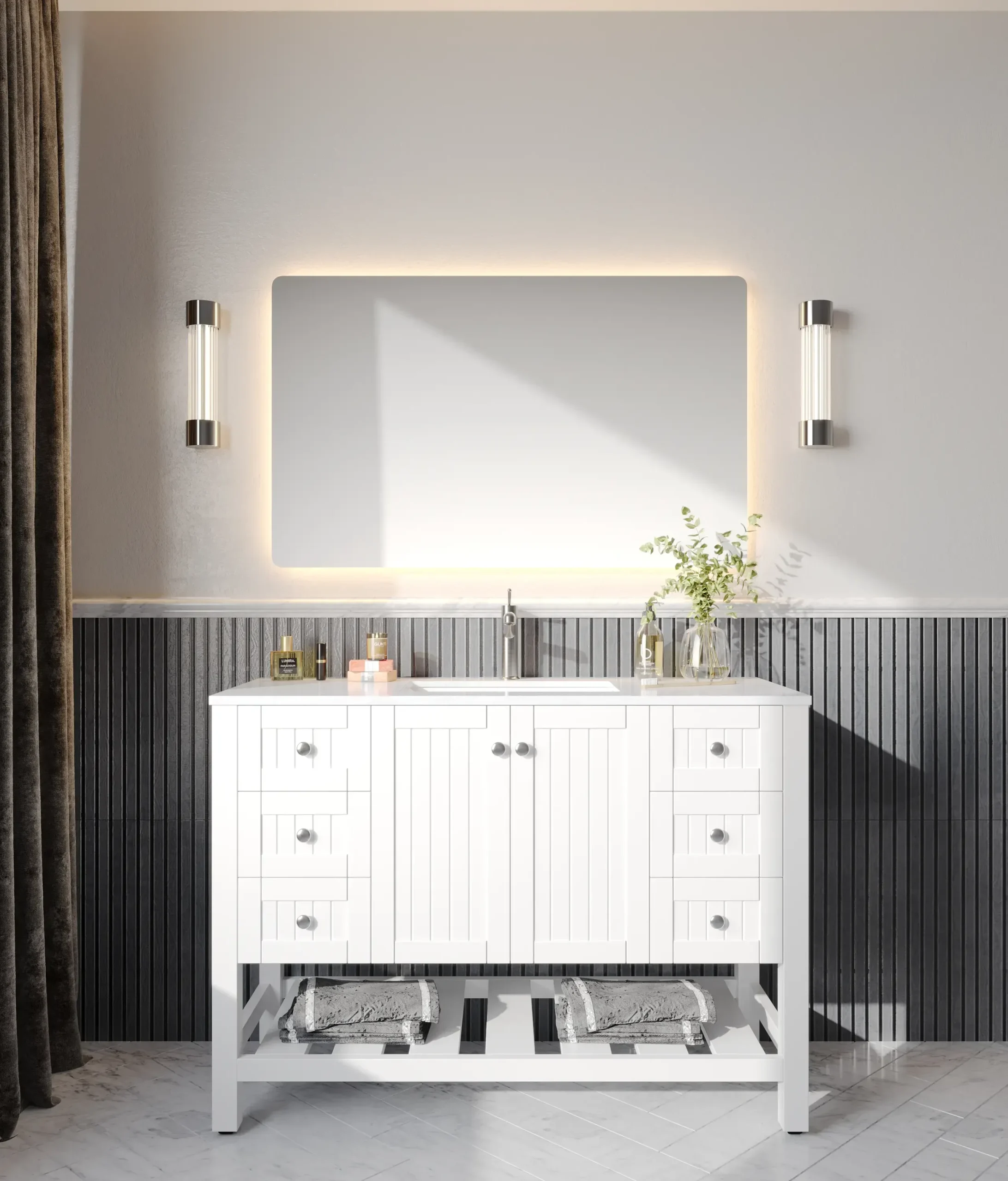 Modern bathroom with illuminated mirror, white vanity, and decorative lighting.