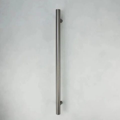 Silver metal door handle on a light gray background.