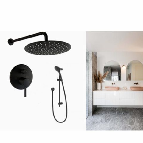 Black shower fixtures and modern bathroom with double sinks and mirrors.