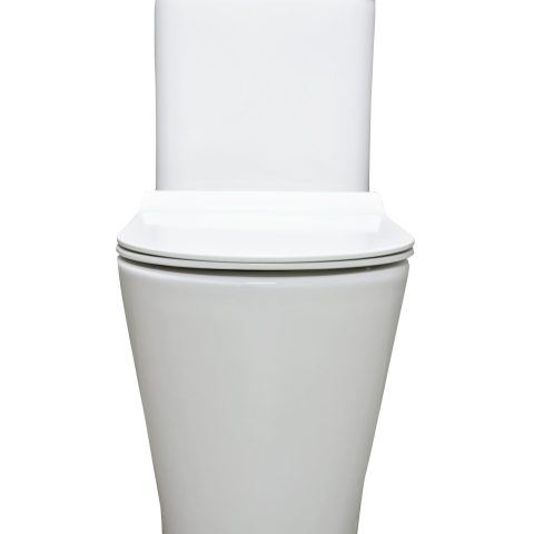 White modern toilet with closed lid, front view.