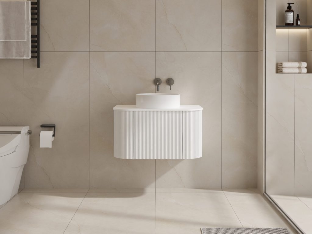 Modern white wall-mounted bathroom sink with minimalist design.