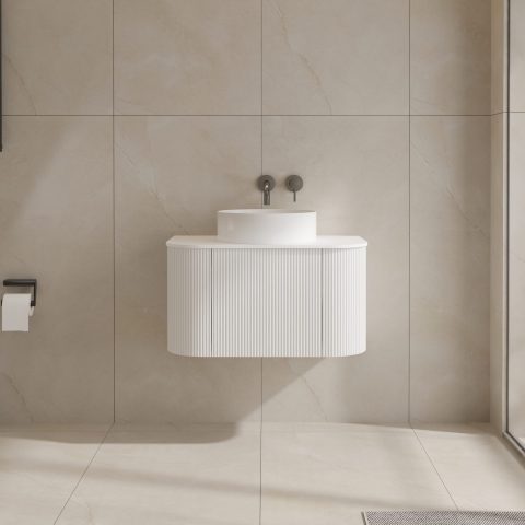 Modern white wall-mounted bathroom sink with minimalist design.