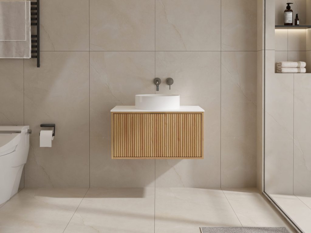 Modern bathroom with wooden vanity, round sink, and wall-mounted faucet.