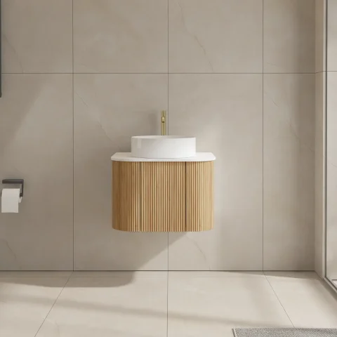 Modern bathroom with wall-mounted sink and wooden cabinet.
