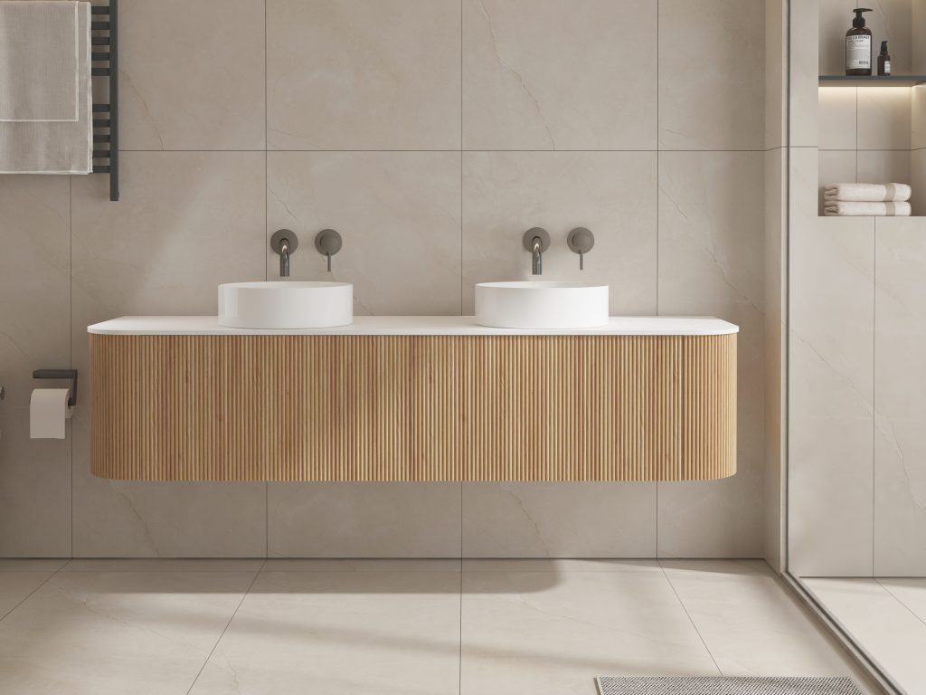Modern bathroom with double sinks and wooden vanity.