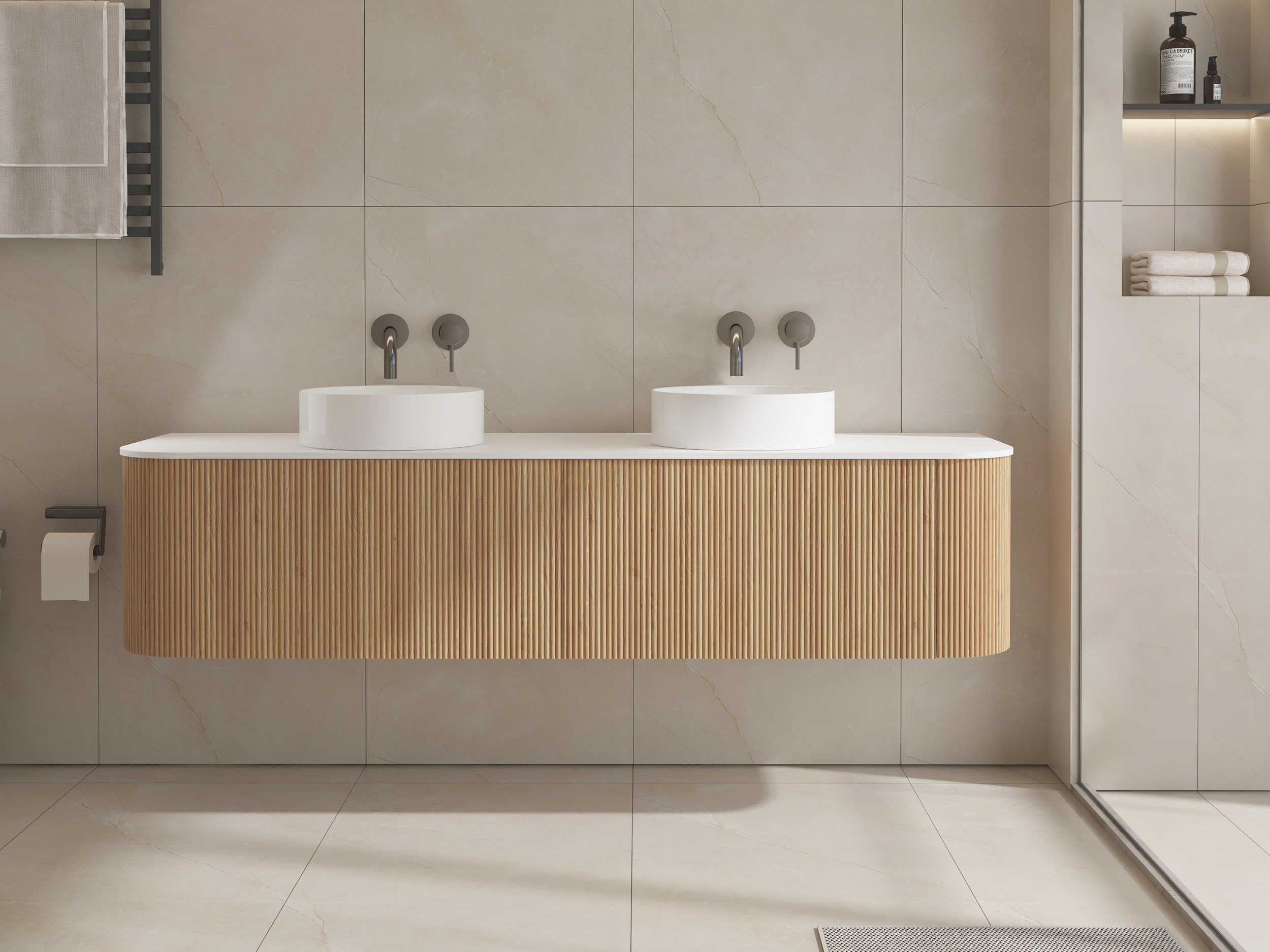 Modern bathroom with double sinks and wooden vanity.