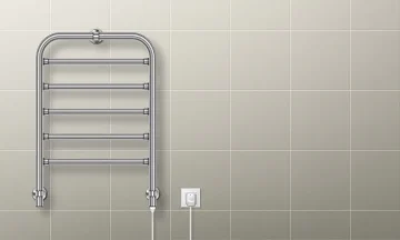 A heated towel rail in chrome finish.