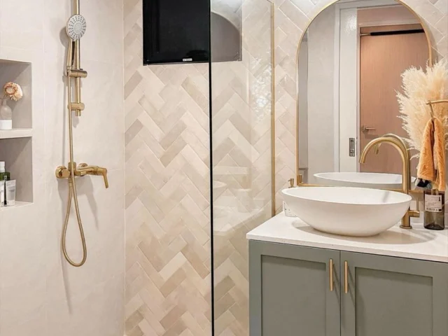 A wall-hung bathroom vanity in pastel colours