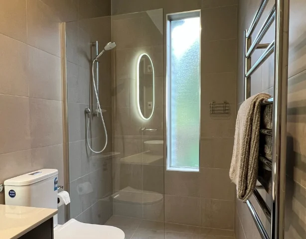 A Frameless shower glass